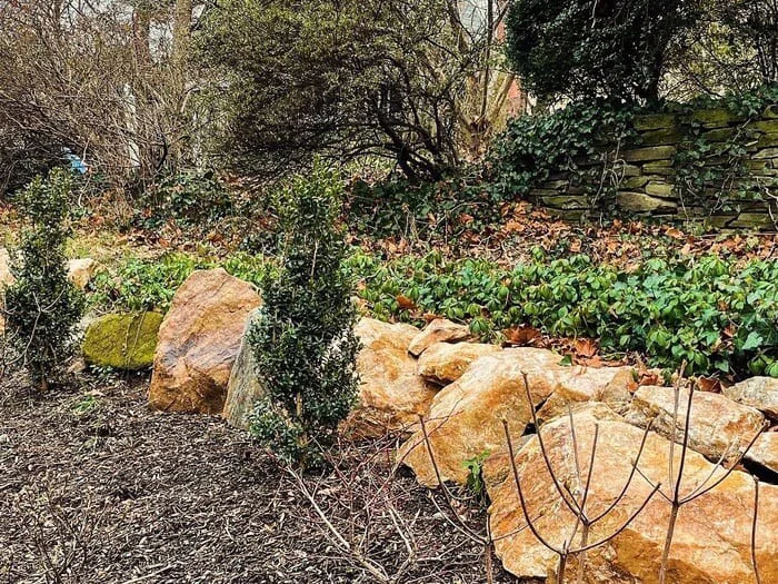 Residential drainage with subsurface drainage renovation, rain garden basin creation, native landscape design and install and boulder wall addition project in Lansdowne, PA
